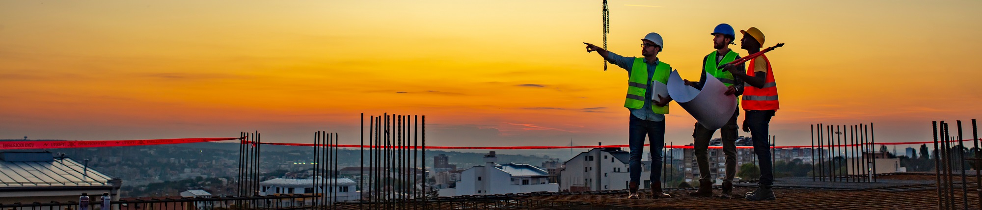 construction workers sunset